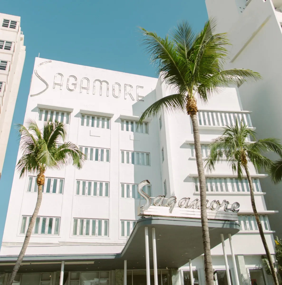 The Sagamore facade on Collins Avenue, with palms